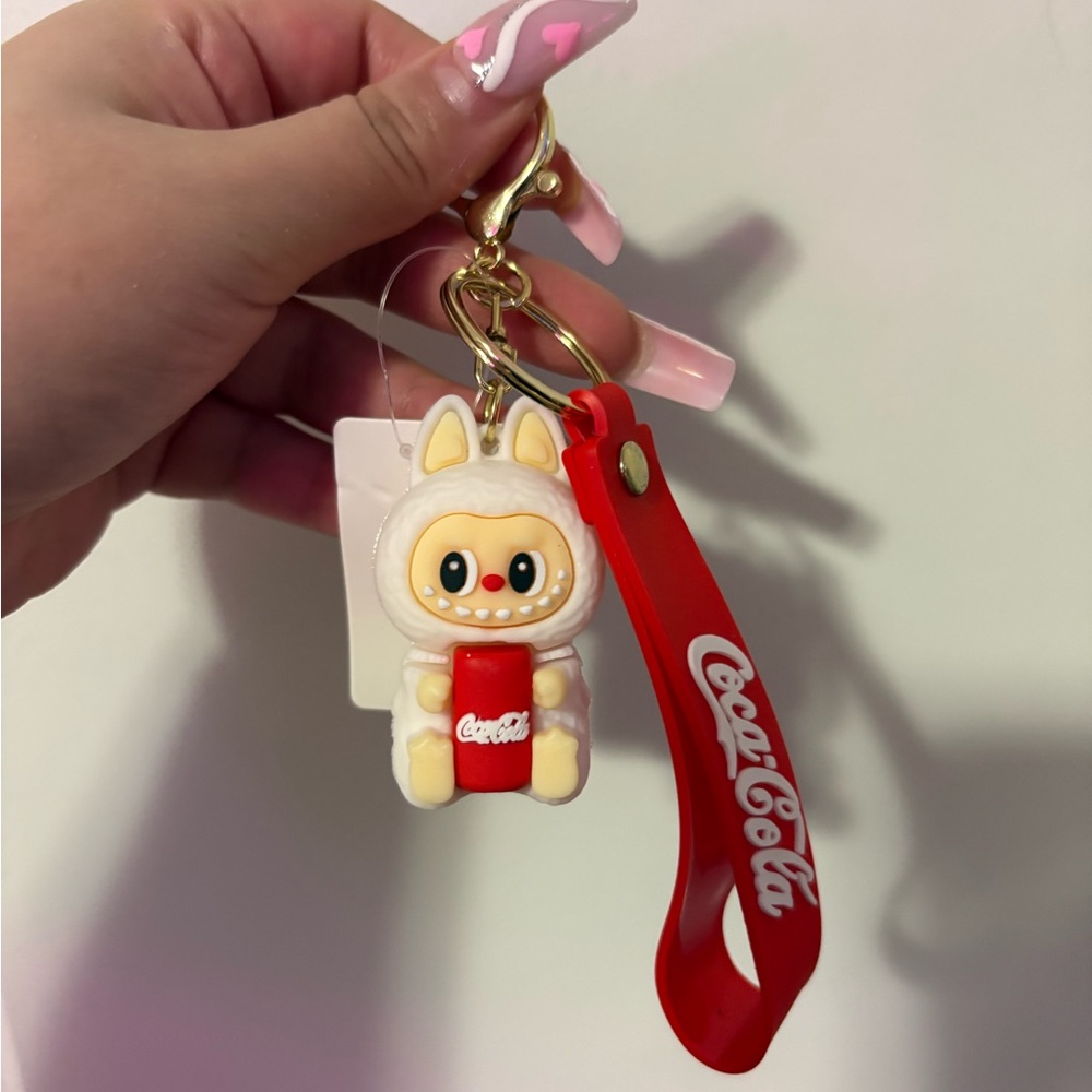 Coca-Cola Red and Cream Mascot Keychain with Gold Hardware